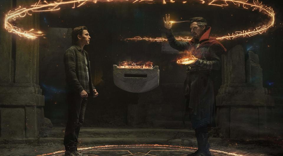 Doctor Strange casts a spell around Peter Parker