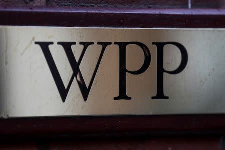A logo hangs on the wall outside the WPP offices in London, Britain April 30, 2018. REUTERS/Simon Dawson