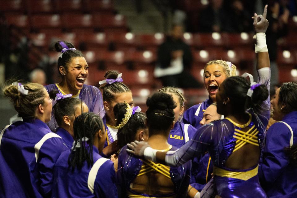 Louisiana State University gymnastics team celebrates Konnor McClain’s perfect score on the bars during the Sprouts Farmers Market Collegiate Quads at Maverik Center in West Valley on Saturday, Jan. 13, 2024. #1 Oklahoma, #2 Utah, #5 LSU, and #12 UCLA competed in the meet. | Megan Nielsen, Deseret News