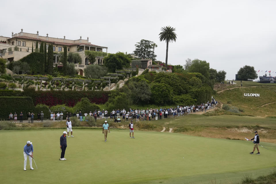 Patrick Cantlay putts on the fourth hole during the second round of the U.S. Open golf tournament at Los Angeles Country Club on Friday, June 16, 2023, in Los Angeles. (AP Photo/Marcio J. Sanchez)