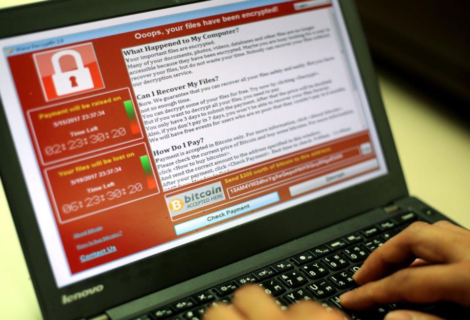 RIT01. Taipei (Taiwan), 12/05/2017.- A programer shows a sample of a ransomware cyberattack on a laptop in Taipei, Taiwan, 13 May, 2017. According to news reports, a 'WannaCry' ransomware cyber attack hits thousands of computers in 99 countries encrypting files from affected computer units and demanding 300 US dollars through bitcoin to decrypt the files. (Atentado, Estados Unidos) EFE/EPA/RITCHIE B. TONGO