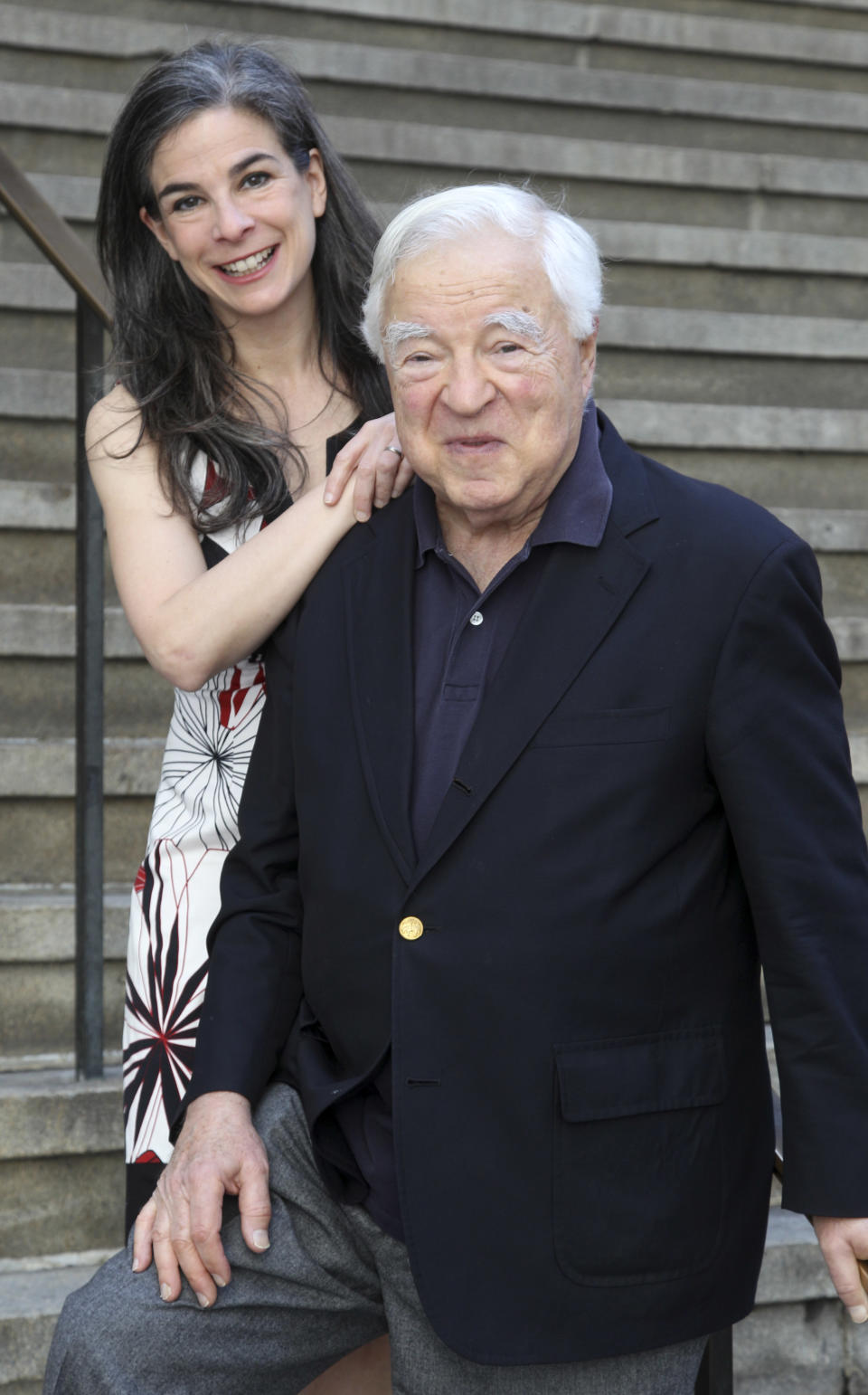 This May 20, 2012 image shows Arthur Frommer, 83, and his daughter, Pauline Frommer, 46, = in New York. The father-daughter team host a live weekly call-in radio show together called “The Travel Show,” on WOR-AM, which is carried on 115 radio stations across the U.S. (AP Photo/Seth Wenig)