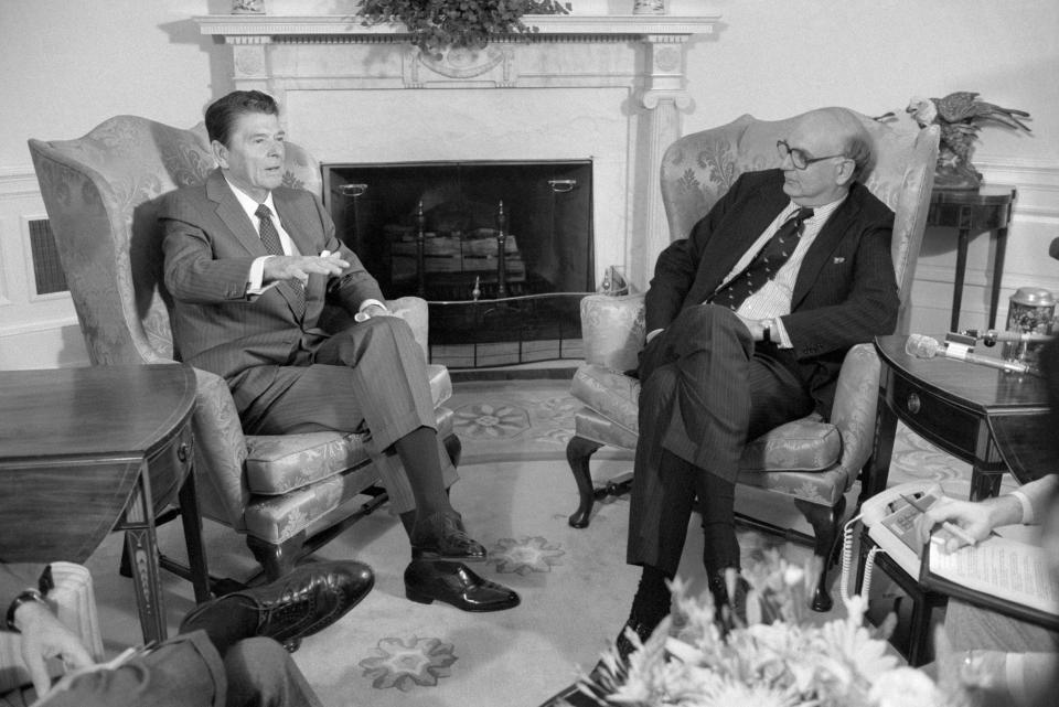 (Original Caption) Washington, D. C.: President Reagan talks with Federal Reserve Board Chairman Paul Volcker in the Oval office. Wall Street investors have expressed concern about the possible effects of the President's plan to cut tax rates across the board.