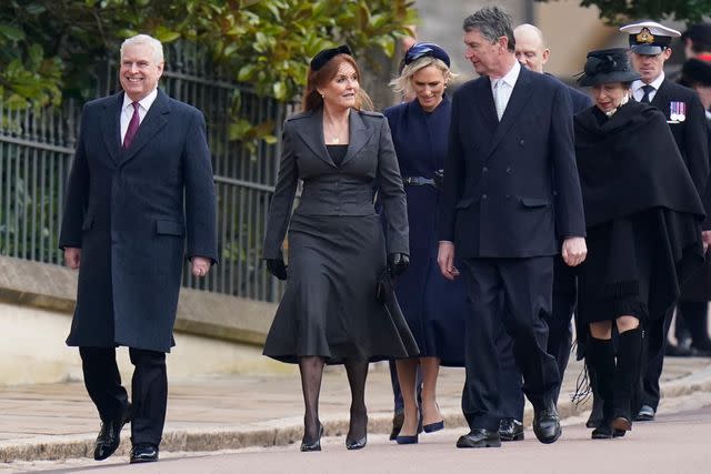 <p>Andrew Matthews - WPA Pool/Getty</p> Prince Andrew and Sarah Ferguson walk to the Thanksgiving Service for King Constantine of Greece at St. George’s Chapel at Windsor Castle on February 27.