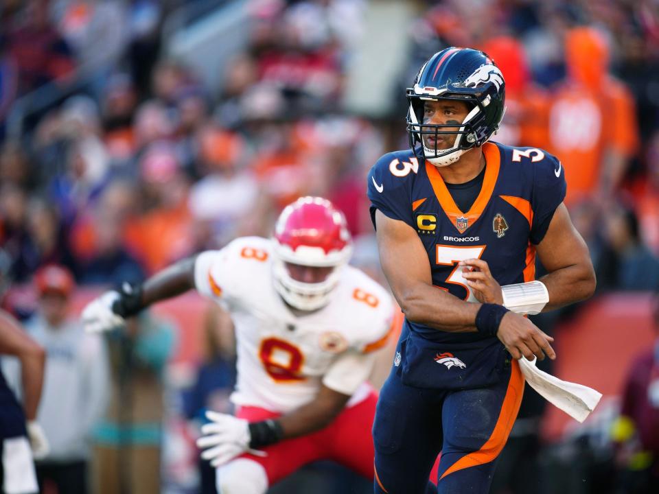 Russell Wilson makes a throw against the Kansas City Chiefs.