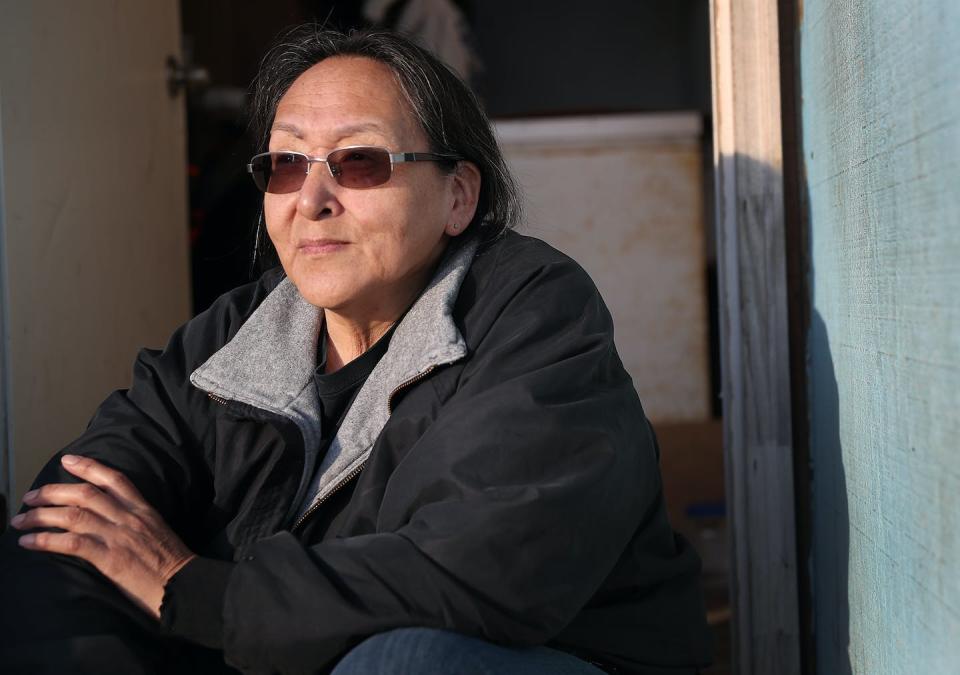 Colleen Swan has been involved in disaster response for decades and has seen an increase in the damage to her island home. <a href="https://www.gettyimages.com/detail/news-photo/city-administrator-colleen-swan-relaxes-at-the-end-of-a-day-news-photo/1175057581" rel="nofollow noopener" target="_blank" data-ylk="slk:Joe Raedle/Getty Images;elm:context_link;itc:0;sec:content-canvas" class="link ">Joe Raedle/Getty Images</a>