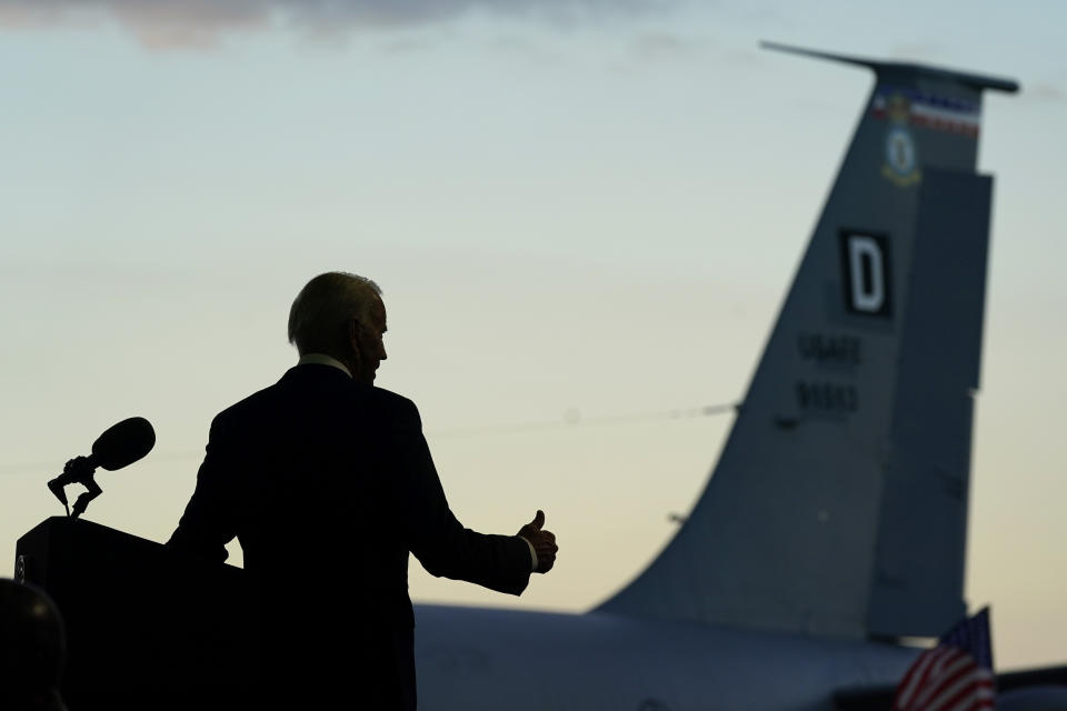 President Joe Biden gestures as he speaks to American service members at RAF Mildenhall in Suffolk, England, Wednesday, June 9, 2021. (AP Photo/Patrick Semansky)