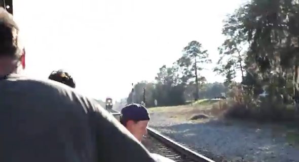 Moment crew flees tracks before train kills camerawoman (video)