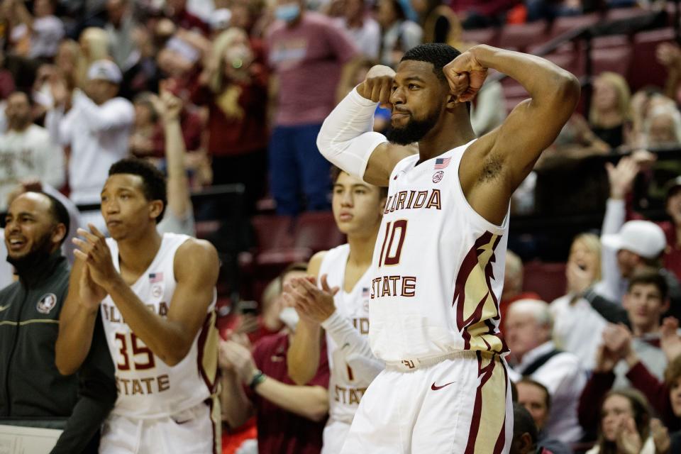 Florida State Seminoles forward Malik Osborne (10) celebrates his teammate's basket. The Florida State Seminoles defeated the Duke Blue Devils 79-78 in overtime at the Donald L. Tucker Civic Center on Tuesday, Jan. 18, 2022.

Fsu V Duke Second Half686