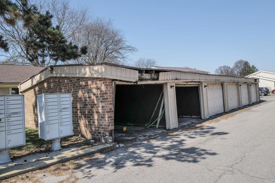 Some of garages in Autumn Ridge are in need of repair. Photo: Sunday, April 9, 2023.