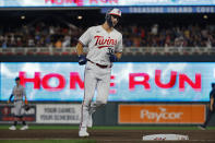 Minnesota Twins' Matt Wallner runs the bases on his grand slam against the Detroit Tigers in the sixth inning of a baseball game Tuesday, Aug. 15, 2023, in Minneapolis. The Twins won 5-3. (AP Photo/Bruce Kluckhohn)