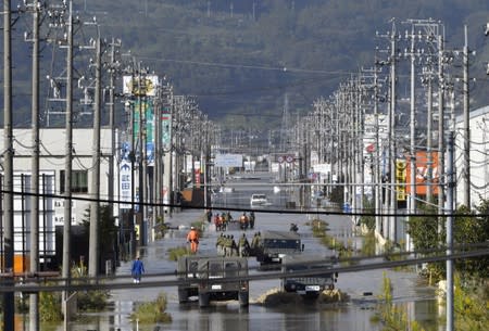 A residential area flooded by the Chikuma river, caused by Typhoon Hagibis is seen in Nagano