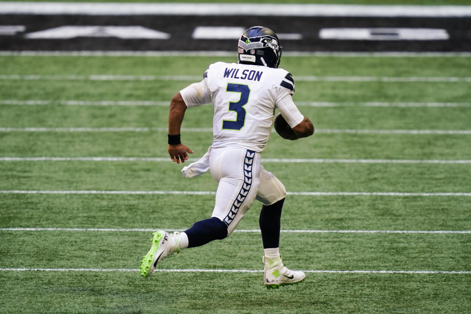 Seattle Seahawks quarterback Russell Wilson (3) runs in the open field against the Atlanta Falcons during the second half of an NFL football game, Sunday, Sept. 13, 2020, in Atlanta. (AP Photo/Brynn Anderson)