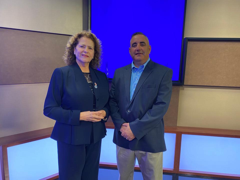 Representative Carol Doherty and challenger Christopher Coute