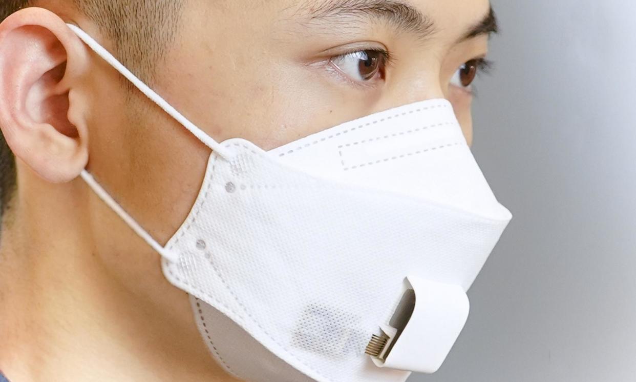 <span>The EBCare mask ‘offers continuous, real-time, and at-home personalised health monitoring’.</span><span>Photograph: WenWheng Heng and Wei Gao/California Institute of Technology</span>