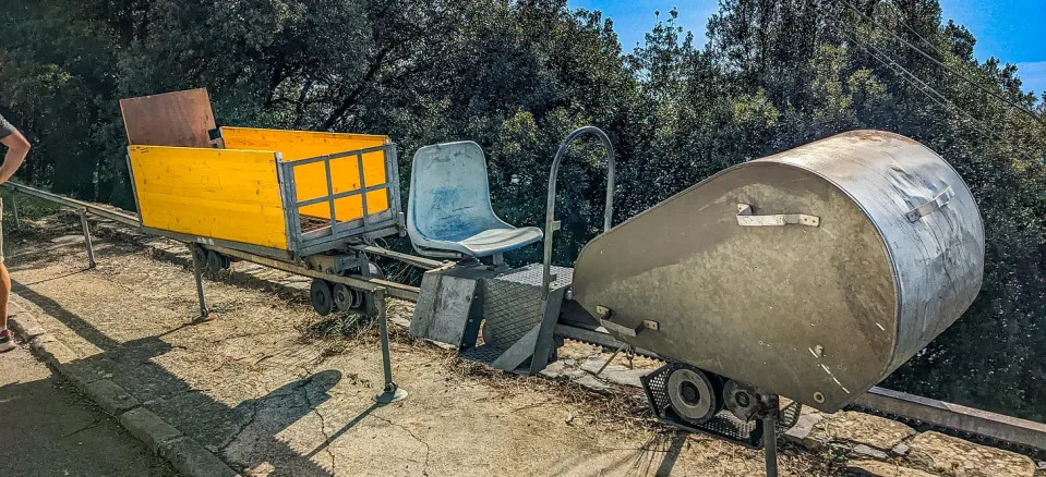 A crude mechanized device to carry olives up and down the hillsides