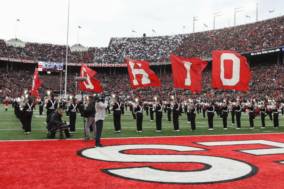 COLUMBUS, OH - OCTOBER 28:  The Ohio State flag bearers run onto the field ahead of the football team prior to the start of the game between the Penn State Nittany Lions (2) and the Ohio State Buckeyes (6) on October 28, 2017 at Ohio Stadium in Columbus, Ohio.  (Photo by Scott W. Grau/Icon Sportswire via Getty Images)