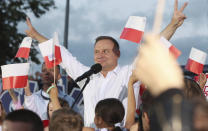 Polish President Andrzej Duda speaks to supporters at a presidential election campaign rally in Lomza, Poland, on Tuesday July 7, 2020. Two bitter rivals are heading into a razor's-edge presidential runoff election Sunday in Poland that is seen as an important test of populism in Europe after a campaign that exacerbated a conservative-liberal divide in the country. (AP Photo/Czarek Sokolowski)