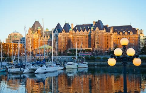 Empress Hotel seen from Victoria Inner Harbour - Credit: Getty