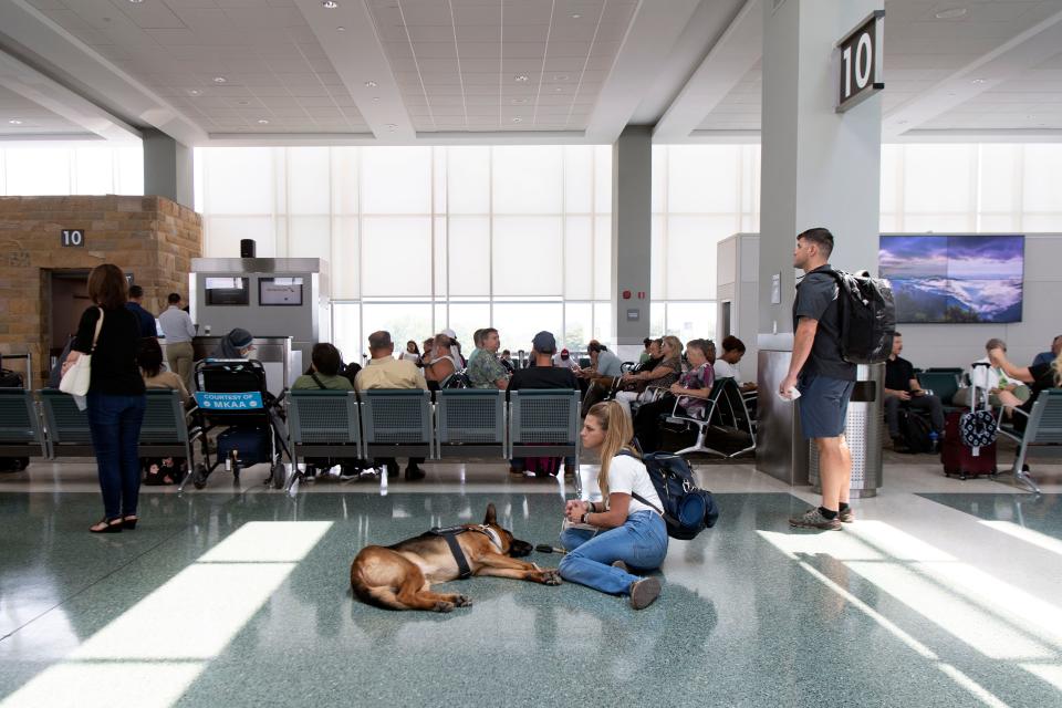 Travelers wait on their flight at McGhee Tyson Airport on July 18. The airport wants to add six more gates by 2028 to meet growing passenger demand.