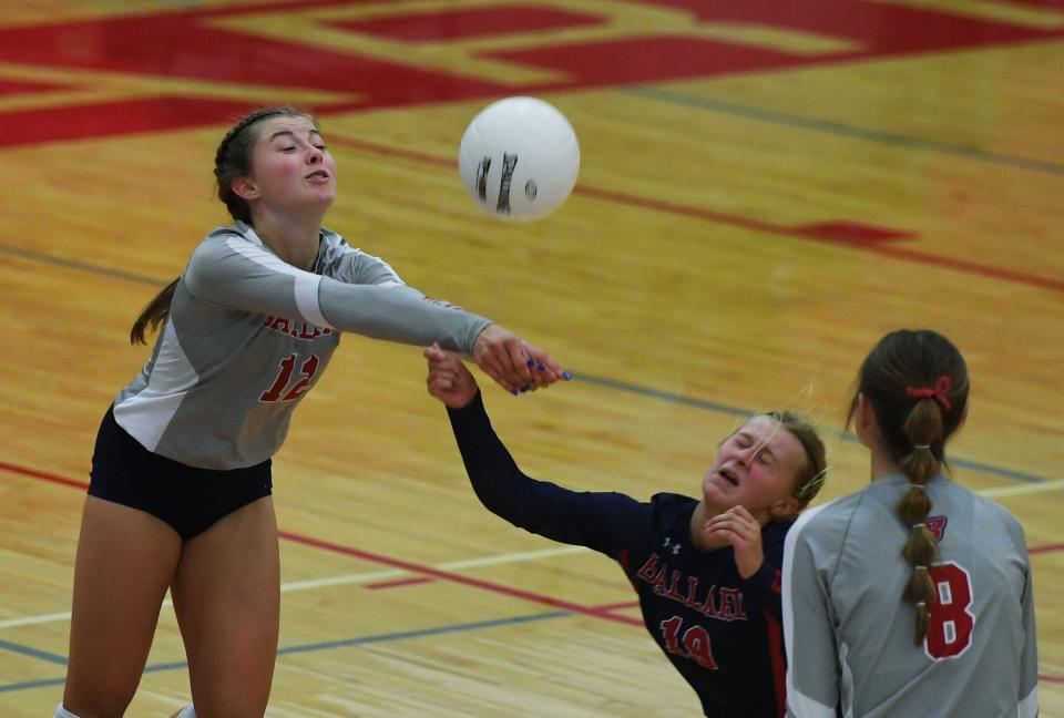 Ballard's Hailey Flanders (12) returns the ball against ADM during the second set of the Bombers' five-set loss to the Tigers at Ballard High School Tuesday, August 30, 2022, in Huxley, Iowa.