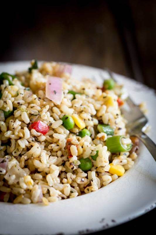 <p>Nutty brown rice, sweet crunchy vegetables and flavor-packed herbs. This brown rice salad is not your average salad. It is nutritious and delicious.</p><p><strong>Get the recipe: <a href="https://www.sprinklesandsprouts.com/brown-rice-salad-with-garden-vegetables/" rel="nofollow noopener" target="_blank" data-ylk="slk:Brown Rice Salad with Garden Vegetables;elm:context_link;itc:0;sec:content-canvas" class="link rapid-noclick-resp">Brown Rice Salad with Garden Vegetables</a></strong></p>