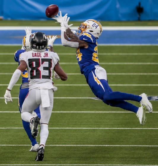 Inglewood, CA, Sunday, Dec. 13, 2020 Los Angeles Chargers free safety Nasir Adderley (24) breaks up a pass.