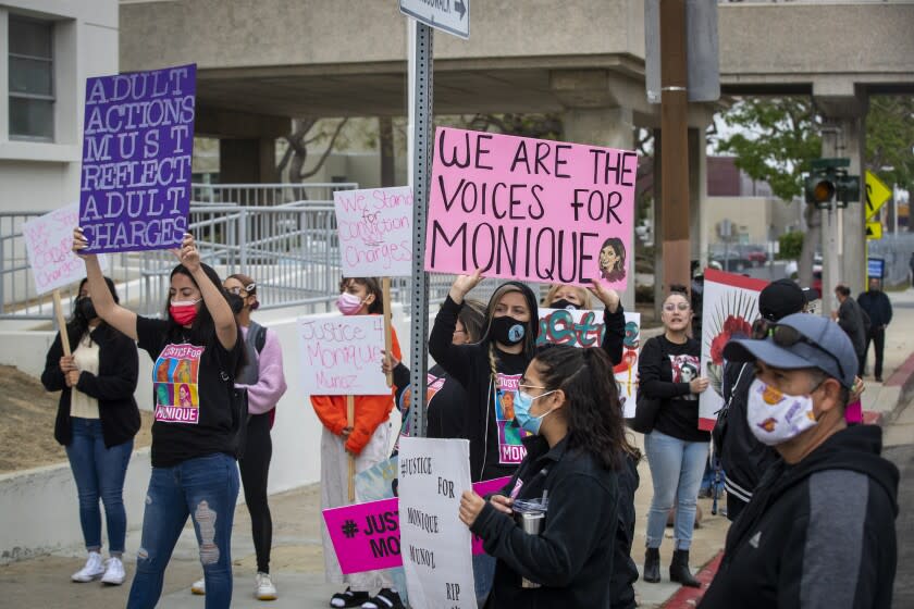 Inglewood, CA - April 23: Family, friends and supporters of Monique Munoz protest outside the Inglewood Juvenile Courthouse where the teen son of a wealthy L.A. entrepreneur was pleading guilty to vehicular manslaughter in the death of Munoz Friday, April 23, 2021. Munoz, 32, of Hawthorne, California, was driving home from work shortly after 5 p.m. on Feb. 17 in West Los Angeles when a black Lamborghini SUV traveling at a high rate of speed collided with her Lexus sedan, police said. (Allen J. Schaben / Los Angeles Times)