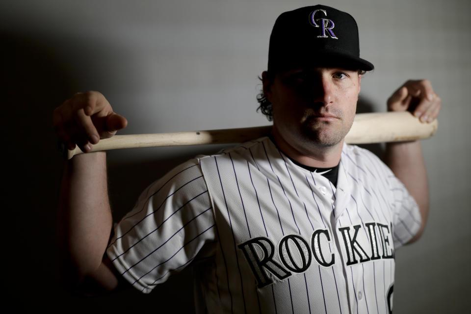 Colorado Rockies second baseman Daniel Murphy poses for a picture at their spring baseball training facility in Scottsdale, Ariz., Wednesday, Feb. 20, 2019. Accustomed to the postseason, Daniel Murphy focused his free agent checklist on playoff contenders. When the ascendant Rockies showed as much interest in Murphy as he had in them, working out the details of a two-year, $24 million contract was no big deal. (AP Photo/Chris Carlson, File)
