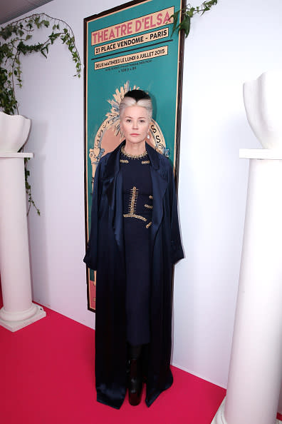 <p>Daphne Guinness, always one to stand out from a crowd, wore a navy blue dress with floor-length silk trench coat and sky-high platform boots. Her multi-hued hair was styled á la inside out Cruella De Vil circa 2015.</p>