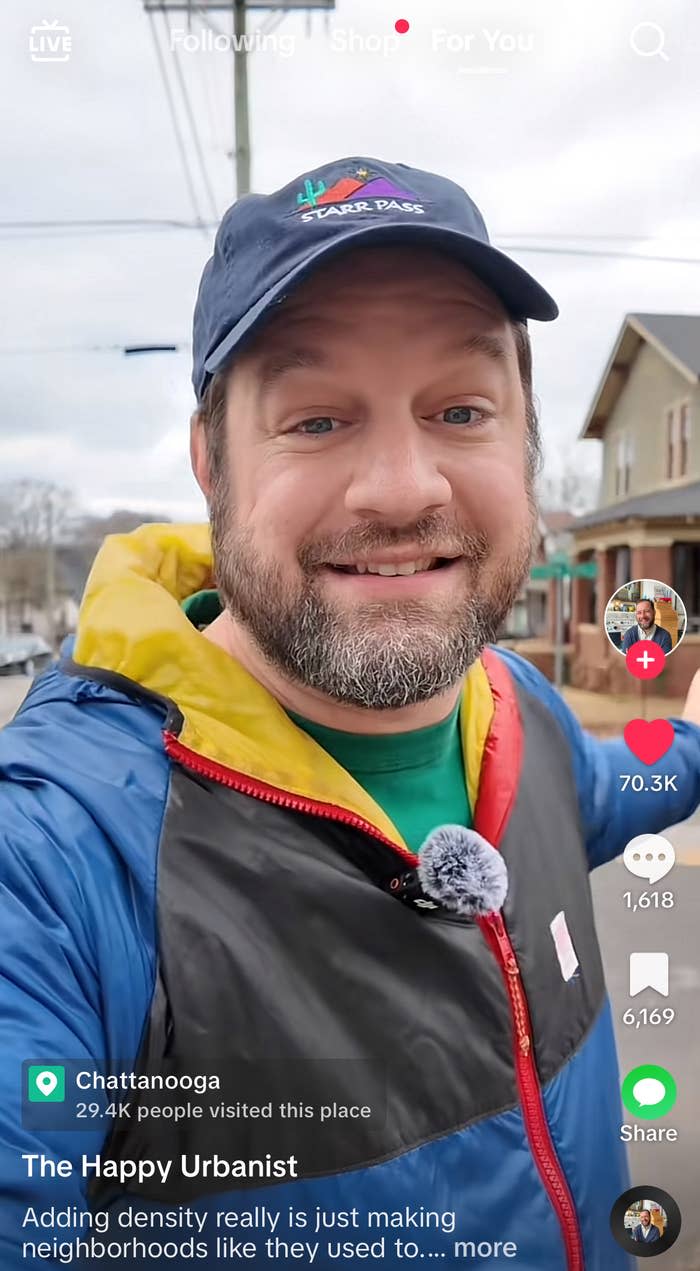 Jon Jon Wesolowski standing on the street in a neighborhood