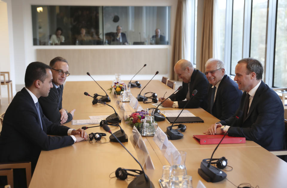 From left, Italian Foreign Minister Luigi Di Maio, German Foreign Minister Heiko Maas, French Foreign Minister Jean-Yves Le Drian, European Union foreign policy chief Josep Borrell and British Foreign Secretary Dominic Raab meet to discuss the situation in Libya at the EEAS building in Brussels, Tuesday, Jan. 7, 2020. The ministers will also hold talks later Tuesday which are expected to center on the situation in Iran and Iraq. (AP Photo/Francisco Seco, Pool)