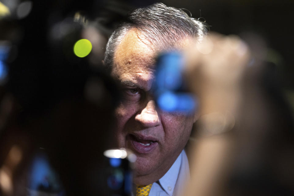 FILE - Former New Jersey governor and Republican presidential candidate Chris Christie speaks to reporters at The Gathering conservative political conference in Buckhead, Ga., on Saturday, Aug. 19, 2023. (Arvin Temkar/Atlanta Journal-Constitution via AP, File)