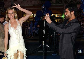 Rebecca Romijn Stamos and John Stamos at the Hollywood premiere of 20th Century Fox's X2: X-Men United