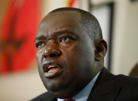 Minister of Foreign Affairs Sibusiso Moyo speaks to Reuters at his office in Harare