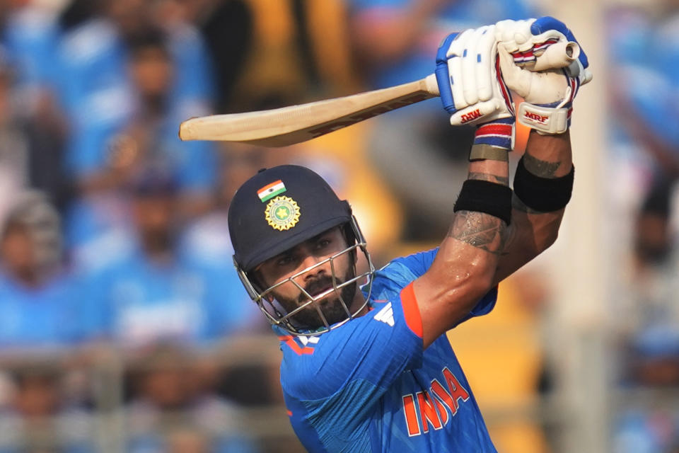 India's Virat Kohli plays a shot during the ICC Men's Cricket World Cup first semi final match between India and New Zealand in Mumbai, India, Wednesday, Nov. 15, 2023. (AP Photo/Rafiq Maqbool)