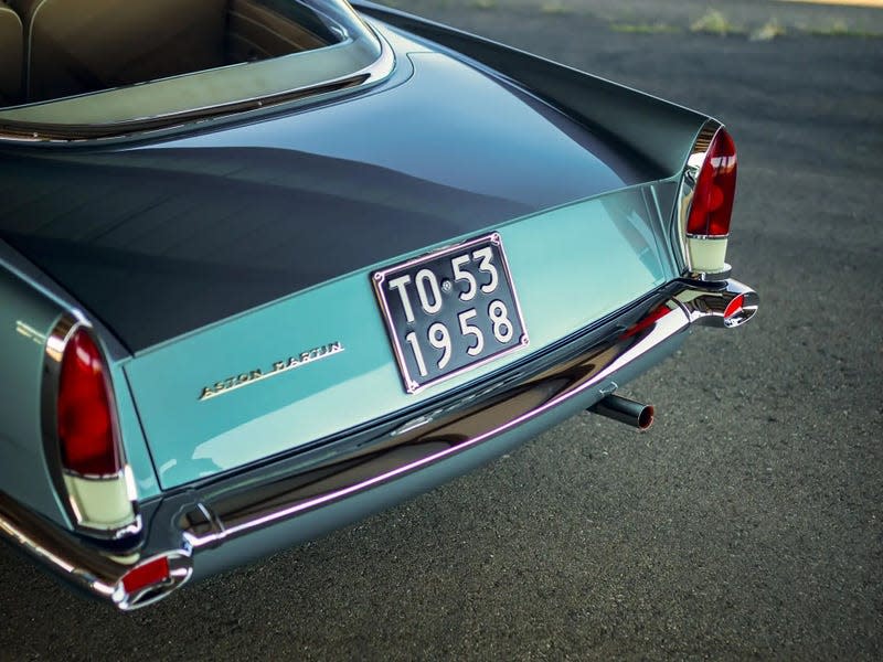 Taillights of a teal Aston Martin DB2/4 by Bertone