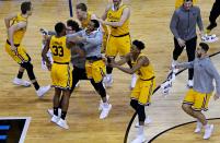 <p>UMBC Retrievers celebrates beating Virginia Cavaliers in the first round of the 2018 NCAA Tournament at Spectrum Center. Mandatory Credit: Peter Casey-USA TODAY Sports </p>