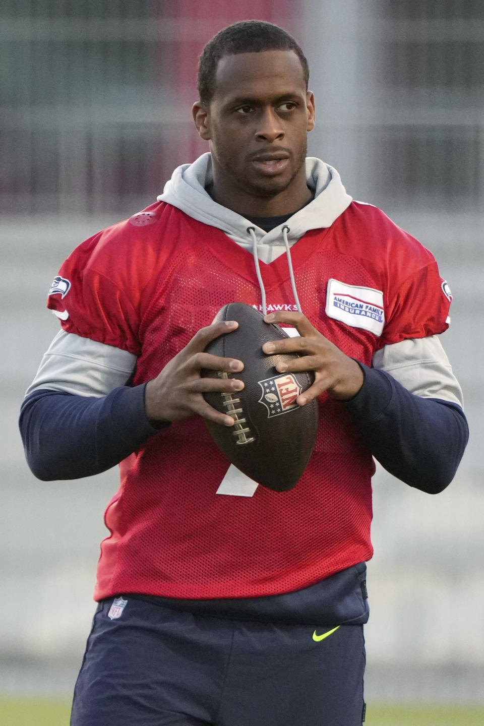 Seattle Seahawks quarterback Geno Smith (7) catches a ball during a practice session in Munich, Germany, Thursday, Nov. 10, 2022. The Tampa Bay Buccaneers are set to play the Seattle Seahawks in a NFL game at the Allianz Arena in Munich on Sunday. (AP Photo/Matthias Schrader)