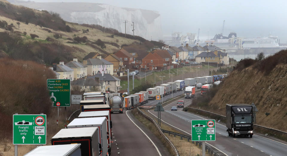 Lorries queue at the entrance to the Port of Dover in Kent as bad weather causes cross Channel ferry delays. (Photo by Gareth Fuller/PA Images via Getty Images)