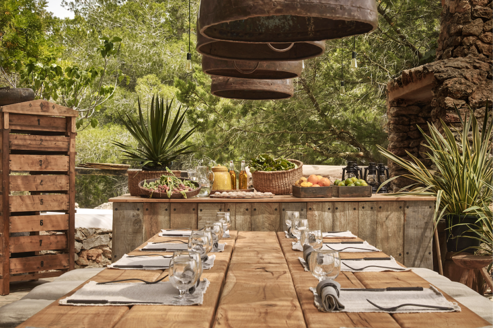 <p>This earthy outdoor space lies in Ibiza's <a href="http://www.lagranjaibiza.com/" rel="nofollow noopener" target="_blank" data-ylk="slk:La Granja;elm:context_link;itc:0;sec:content-canvas" class="link ">La Granja</a>, a biodynamic farm and inn. The farm's design is heavily influenced by <a href="https://japanology.org/2016/04/what-does-wabi-sabi-mean/" rel="nofollow noopener" target="_blank" data-ylk="slk:wabi-sabi;elm:context_link;itc:0;sec:content-canvas" class="link ">wabi-sabi</a>, the Japanese art of embracing the natural — flaws and all — which leans towards a more rustic, organically styled home. We love this relaxing outdoor bar, inviting one and all, not only to dine, but to simply be. </p>