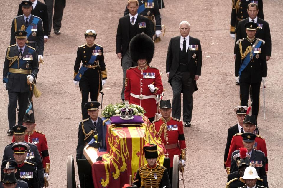 Members of the British royal family follow Queen Elizabeth II’s coffin during ceremonial procession (Getty Images)