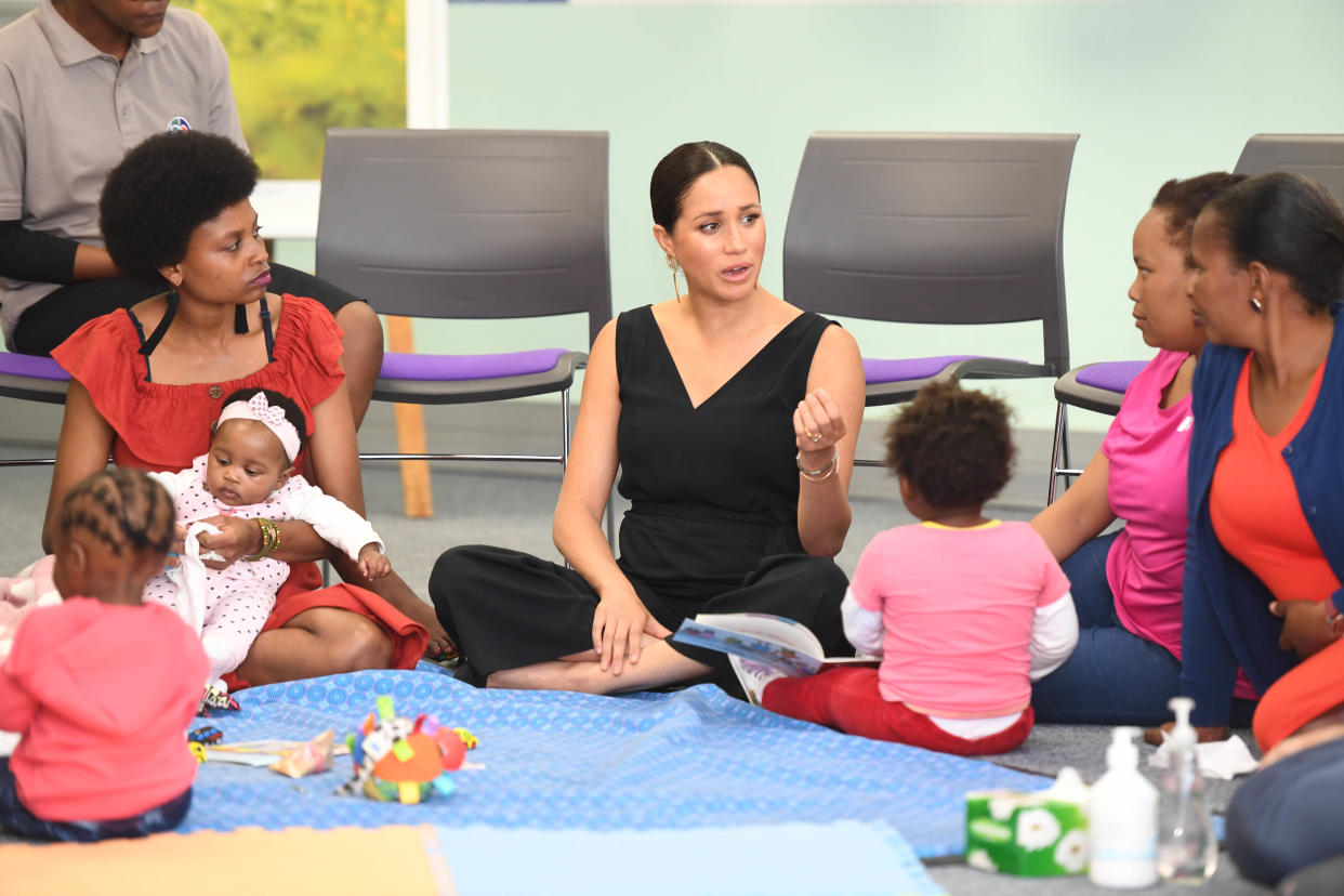 CAPE TOWN, SOUTH AFRICA - SEPTEMBER 25:  Meghan, Duchess of Sussex visits mothers2mothers during her royal tour of South Africa with Prince Harry, Duke of Sussex on September 25, 2019 in Cape Town, South Africa. mothers2mothers (m2m) is an African not-for-profit organisation with the vision of a healthy, HIV-free Africa. The organisation trains and employs women living with HIV as frontline health workers across eight African nations.  (Photo by Paul Edwards - Pool/Getty Images)