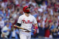 Philadelphia Phillies designated hitter Bryce Harper (3) watches his two-run home run during the third inning in Game 3 of baseball's National League Division Series against the Atlanta Braves, Friday, Oct. 14, 2022, in Philadelphia. (AP Photo/Matt Rourke)