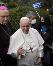 Pope Francis arrives for a meeting with young people at the Saint Dionysius School of the Ursuline Sisters in Athens, Greece, Monday, Dec. 6, 2021. Francis' five-day trip to Cyprus and Greece has been dominated by the migrant issue and Francis' call for European countries to stop building walls, stoking fears and shutting out "those in greater need who knock at our door." (AP Photo/Alessandra Tarantino)