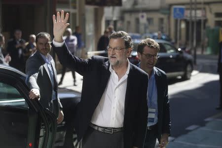 Spain's acting Prime Minister Mariano Rajoy arrives at the Popular Party's provincial congress in Pontevedra, Spain March 13, 2016. REUTERS/Miguel Vidal