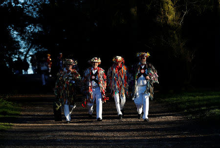 Leicester Morrismen arrive to dance during May Day celebrations at Bradgate Park in Newtown Linford, Britain May 1, 2018. REUTERS/Darren Staples