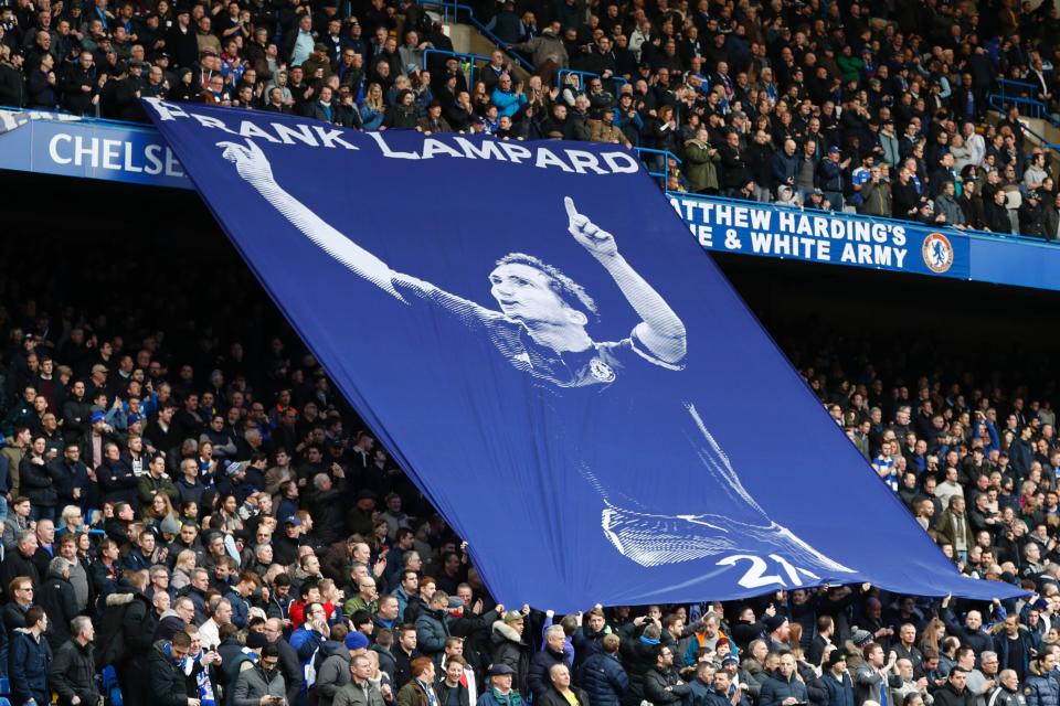 Spectators display a banner honouring former Chelsea midfielder Frank Lampard during the English Premier League football match between Chelsea and Arsenal at Stamford Bridge in London on February 4, 2017. Former England and Chelsea midfield star Frank Lampard retired on February 2 aged 38, calling time on a playing career that will be remembered as one of the Premier League's finest. / AFP PHOTO / Adrian DENNIS / RESTRICTED TO EDITORIAL USE. No use with unauthorized audio, video, data, fixture lists, club/league logos or 'live' services. Online in-match use limited to 75 images, no video emulation. No use in betting, games or single club/league/player publications.  /         (Photo credit should read ADRIAN DENNIS/AFP/Getty Images)