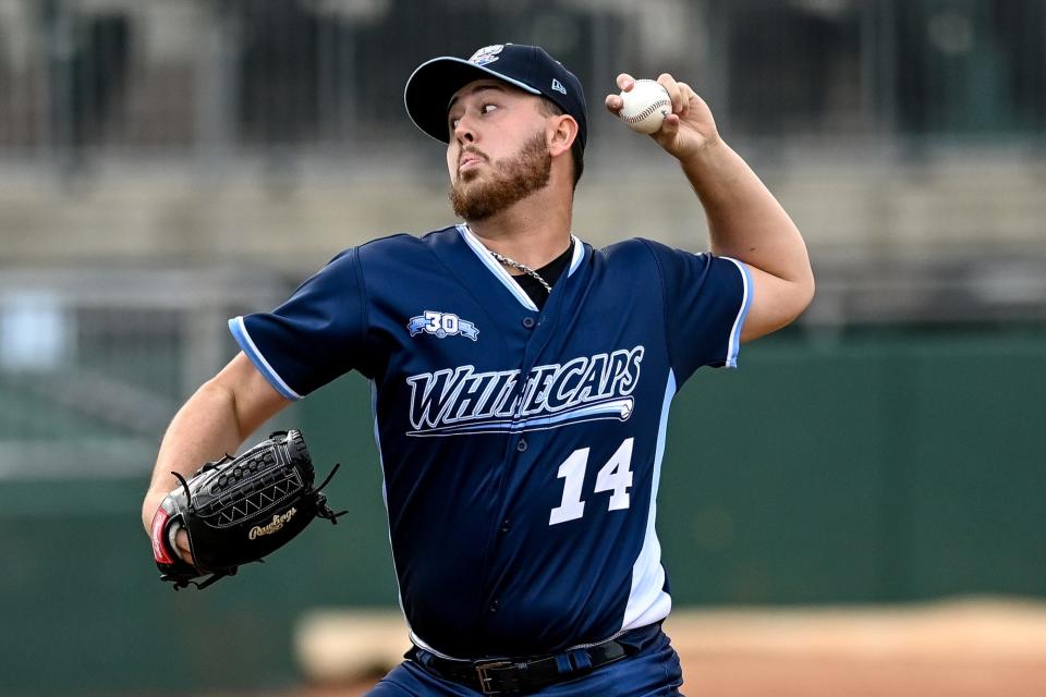 Whitecaps' Jack O'Loughlin pitches to a Lugnuts batter in the first inning on Tuesday, April 11, 2023, at Jackson Field in Lansing.