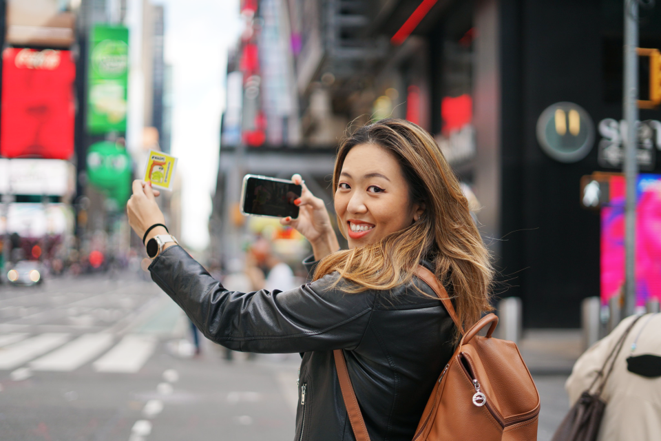 Chanel Lee, creator of Tasty Toastys NFT collection, in Times Square, New York. (PHOTO: Chanel Lee)